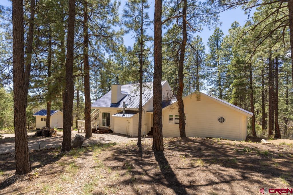 171 Deer Trail Road Durango, CO 81303 - Photo 35 of 35 a view of a house with a yard covered in snow