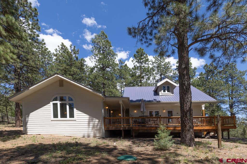 171 Deer Trail Road Durango, CO 81303 - Photo 5 of 35 a front view of a house