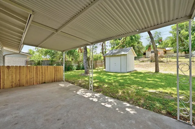 a view of a backyard with a garden