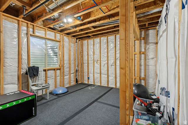 40 Wheeler Road Heber City, UT 84032 - Photo 33 of 41 Unfinished basement space with exposed wood framing, ceiling joists, and a single window