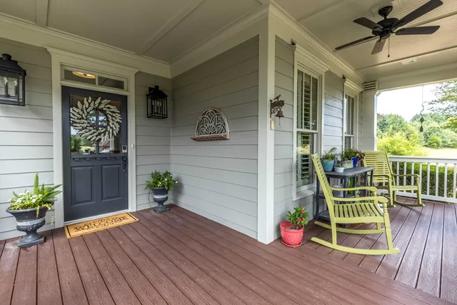 a bathroom with a toilet a sink and shower