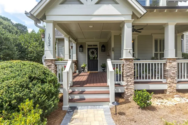 a front view of a house with a porch