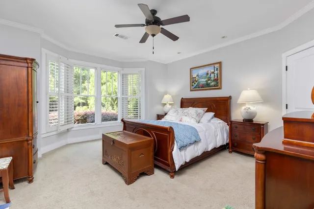 a room with cabinets and painting on the wall