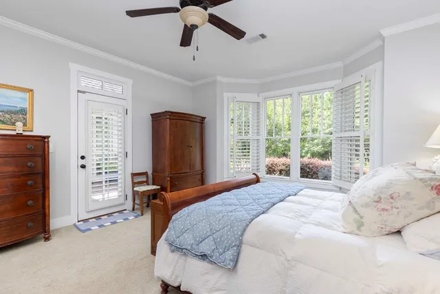 a kitchen with stainless steel appliances granite countertop a sink stove and a window