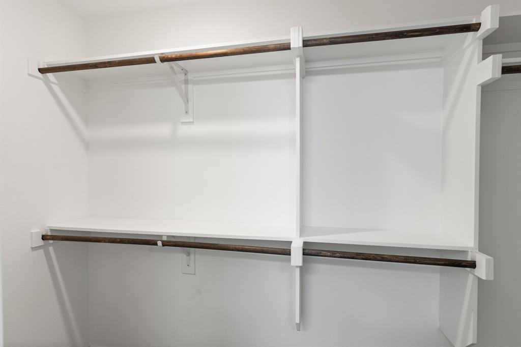 810 South Main Street Kemp, TX 75143 - Photo 14 of 16 a view of an empty walk in closet