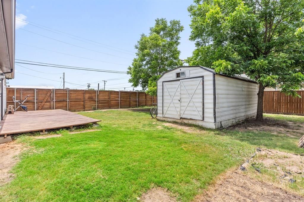 810 South Main Street Kemp, TX 75143 - Photo 15 of 16 a view of a backyard with a cabin