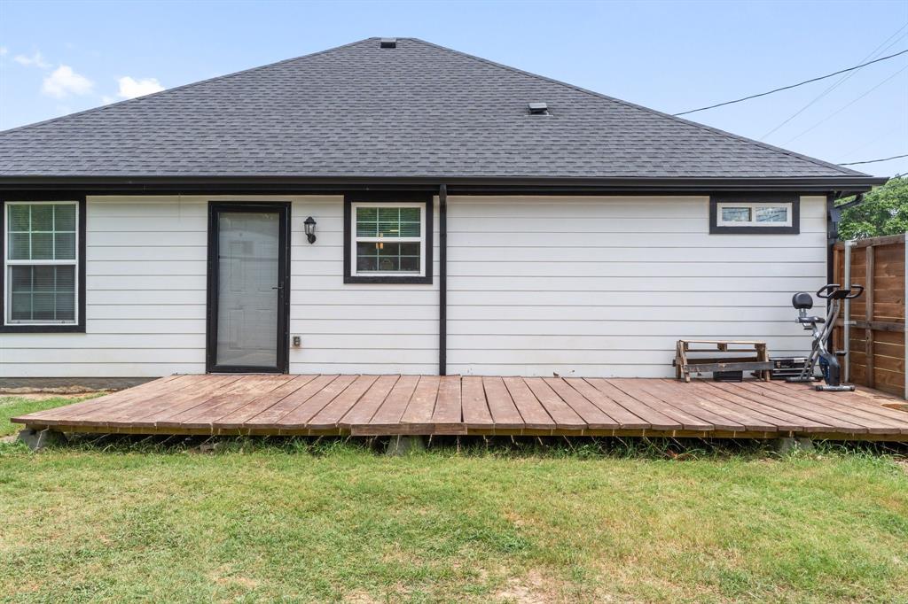 810 South Main Street Kemp, TX 75143 - Photo 16 of 16 a view of a house with wooden deck and sitting area