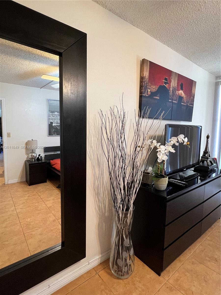 17011 North Bay Road, Unit 918 Sunny Isles Beach, FL 33160 - Photo 13 of 21 a living room with furniture