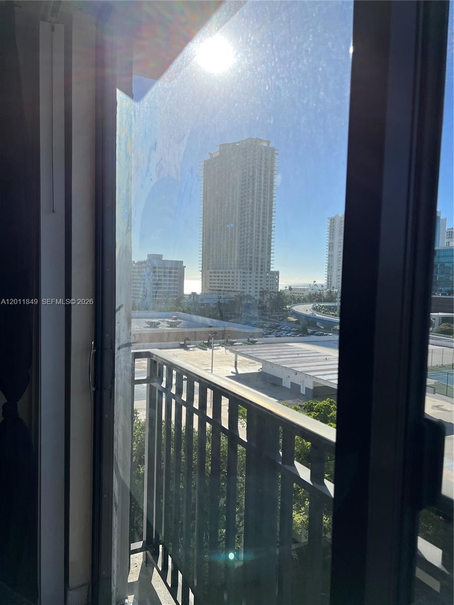 17011 North Bay Road, Unit 918 Sunny Isles Beach, FL 33160 - Photo 16 of 21 a view of balcony with wooden floor
