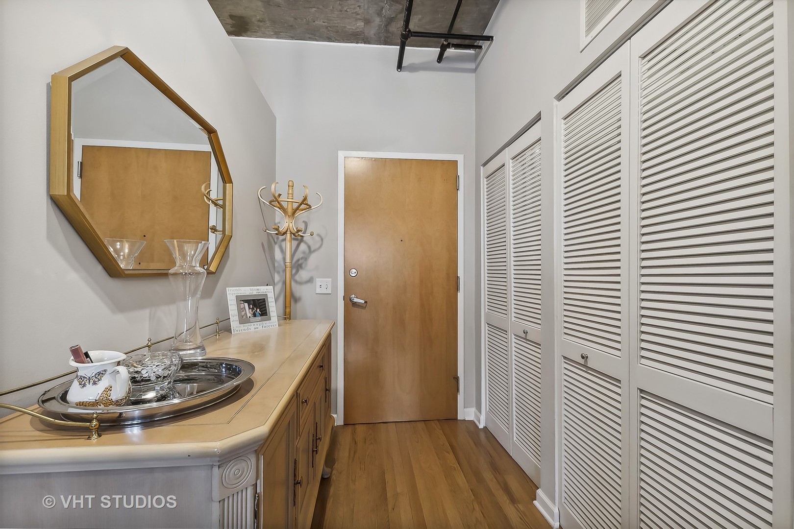 111 South Morgan Street, Unit 620 Chicago, IL 60607 - Photo 2 of 13 a bathroom with a sink and a mirror