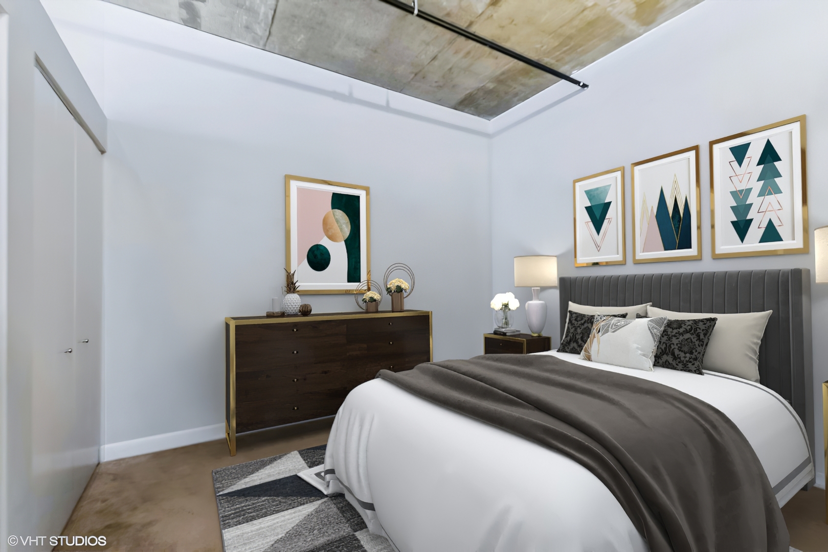 111 South Morgan Street, Unit 620 Chicago, IL 60607 - Photo 8 of 13 a bedroom with a bed and a table