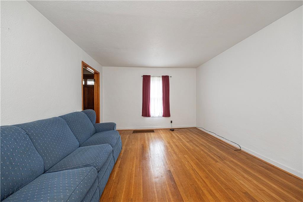 7300 Hutchinson Road Elizabeth, PA 15037 - Photo 7 of 42 The living room is 15'x11'10".