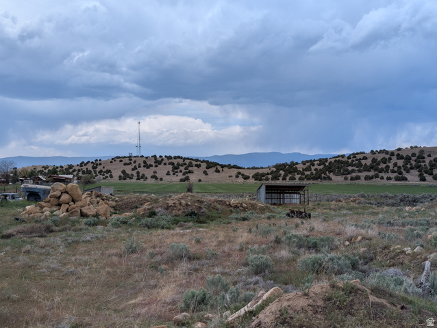 11799 Cove Creek Road Mount Pleasant, UT 84647 - Photo 10 of 15 Expansive rural landscape featuring rolling hills with scattered vegetation and distant mountains