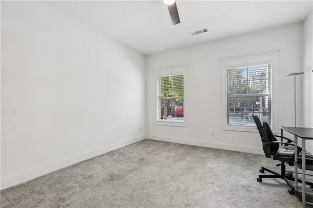 an empty room with windows