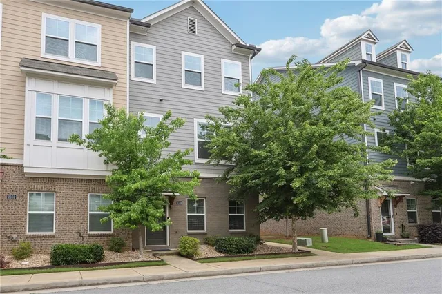 front view of a house and a yard