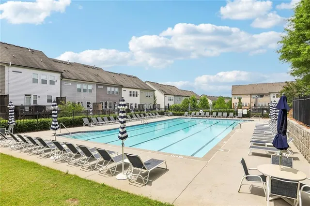 a view of a patio with swimming pool