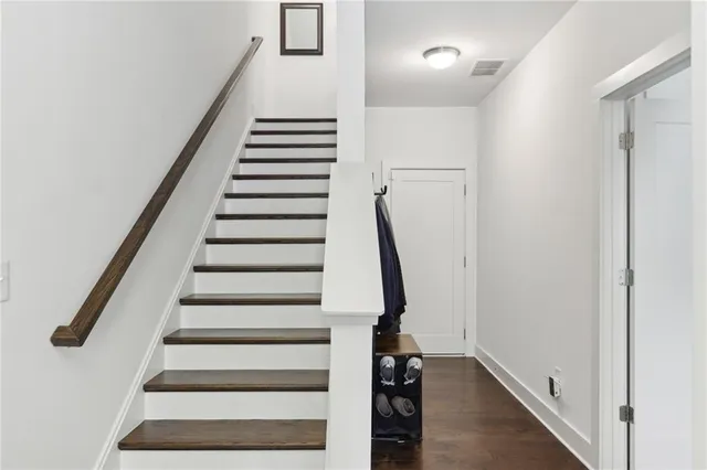 a view of entryway with wooden floor