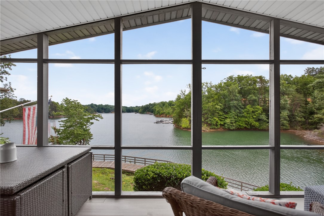 1230 Melton Road, Unit 4 West Union, SC 29696 - Photo 1 of 48 Panoramic lake views from a charming screened porch create an idyllic retreat.
