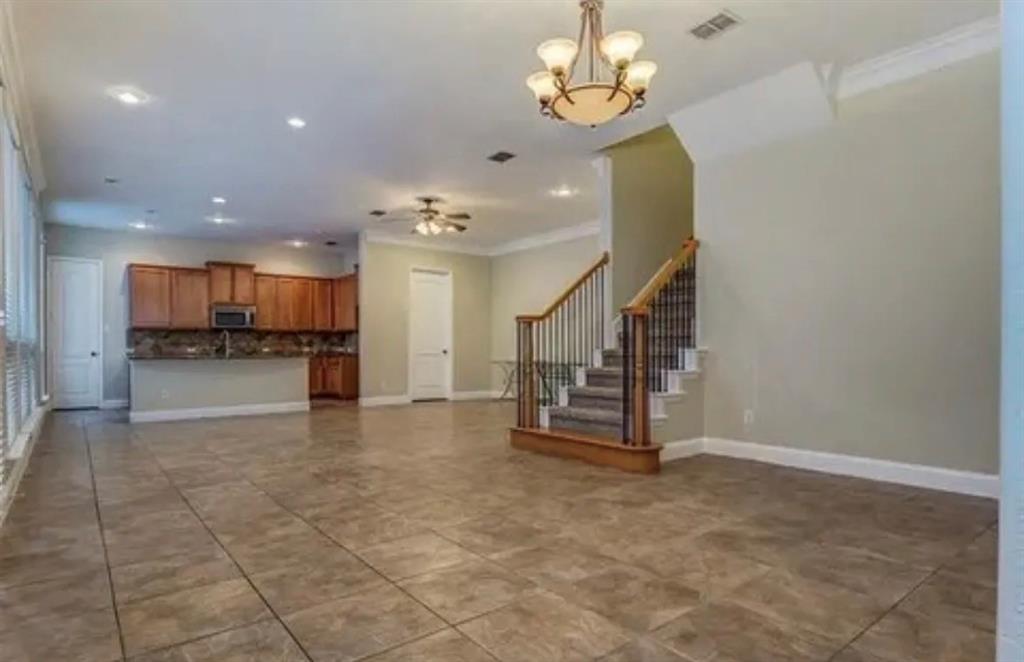 228 Wallington Way Lewisville, TX 75067 - Photo 17 of 22 a view of a livingroom with a kitchen