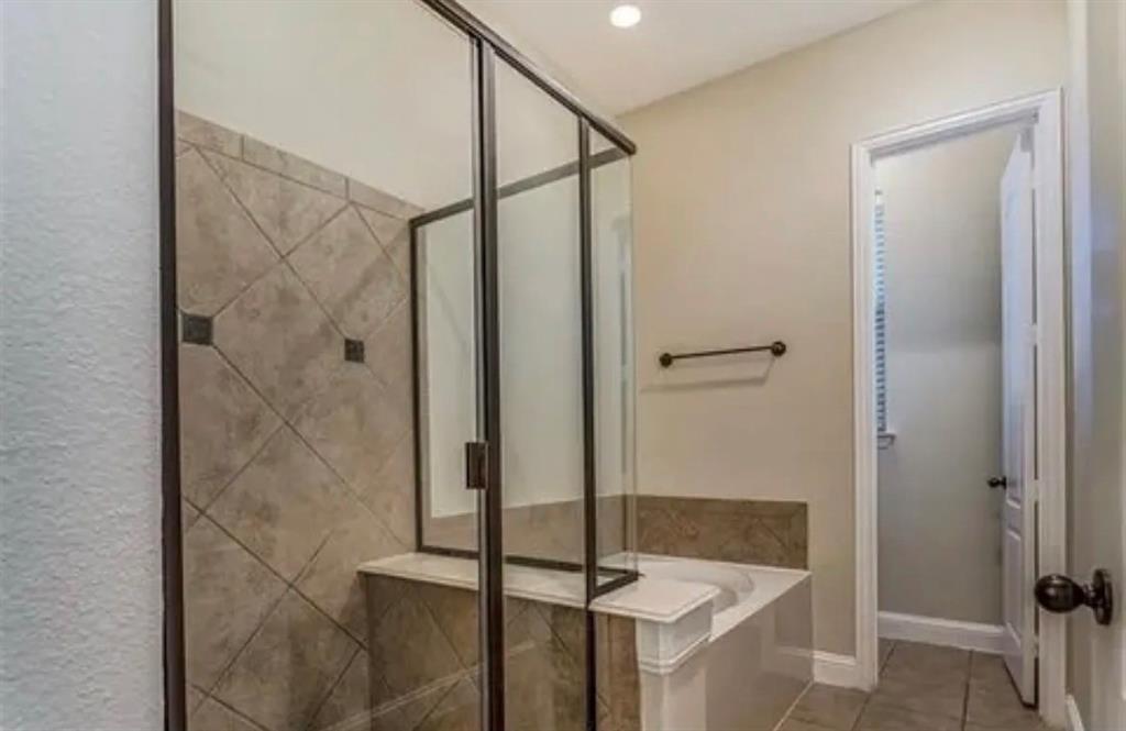 228 Wallington Way Lewisville, TX 75067 - Photo 21 of 22 a bathroom with a shower and a sink