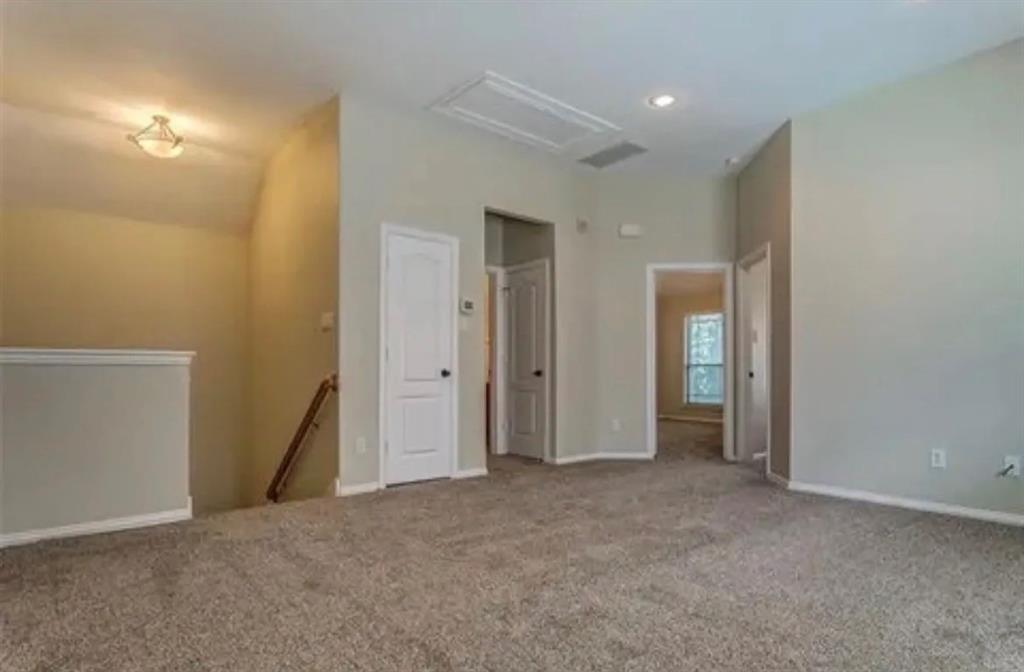 228 Wallington Way Lewisville, TX 75067 - Photo 4 of 22 an empty room with closet and mirror