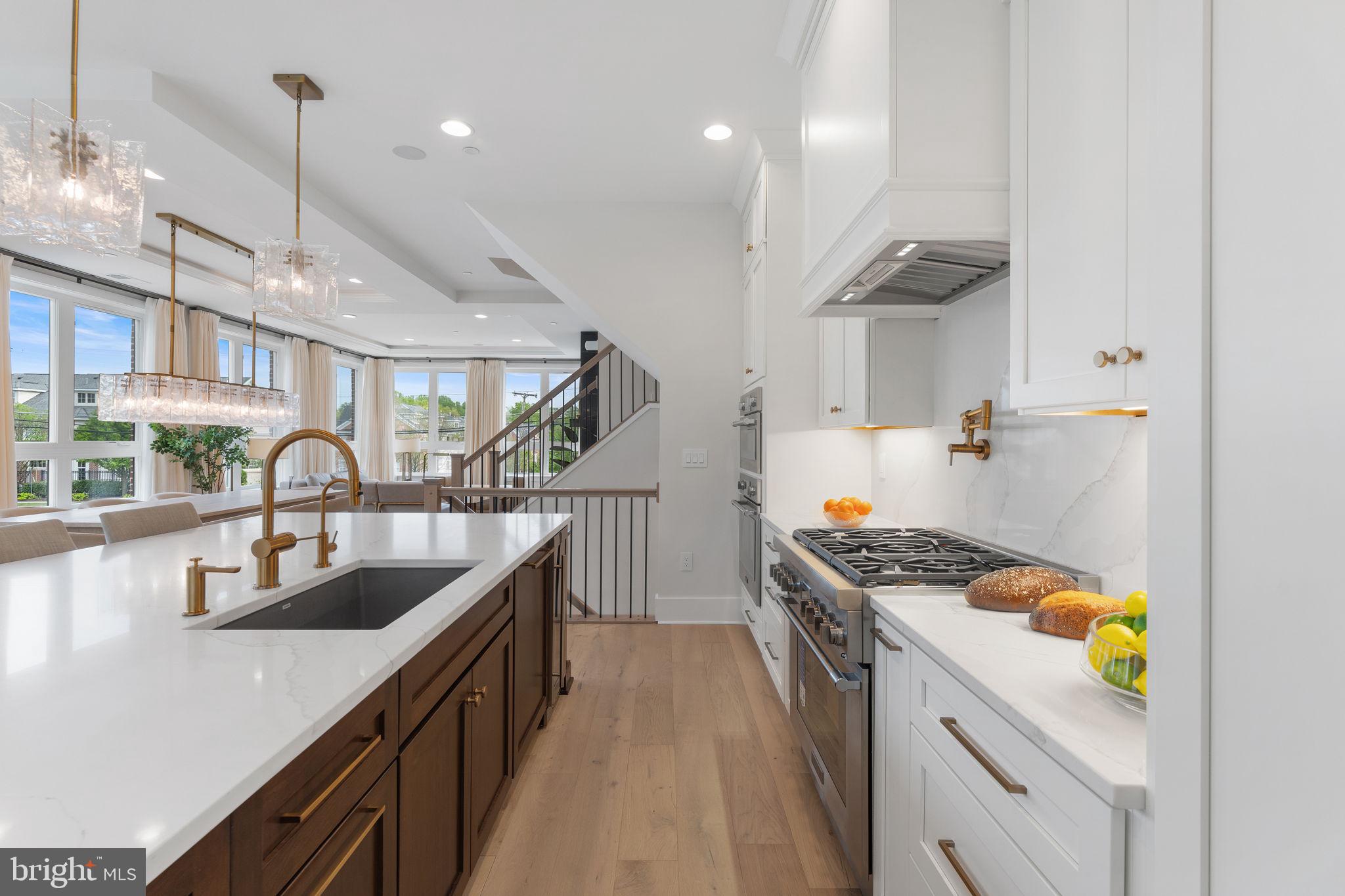 1624 Chain Bridge Road McLean, VA 22101 - Photo 7 of 10 a kitchen that has a lot of cabinets in it