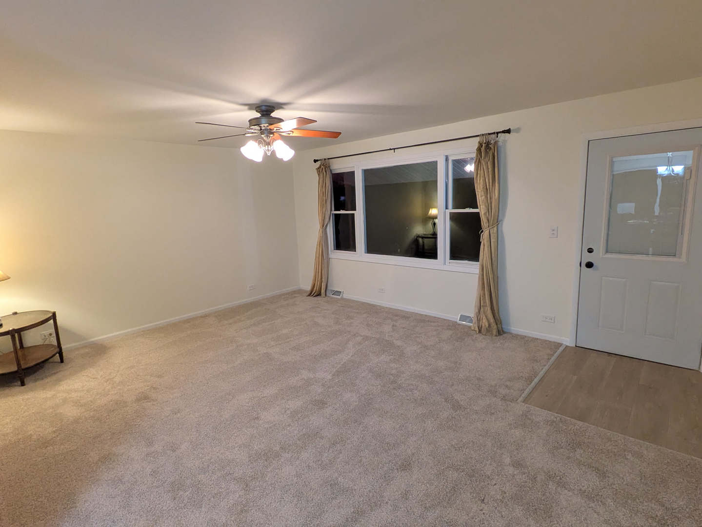 24031 South Cardinal Drive Channahon, IL 60410 - Photo 15 of 39 an empty room with chandelier fan and windows
