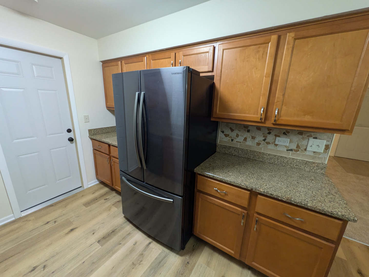 24031 South Cardinal Drive Channahon, IL 60410 - Photo 10 of 39 a kitchen with stainless steel appliances granite countertop a refrigerator and a sink