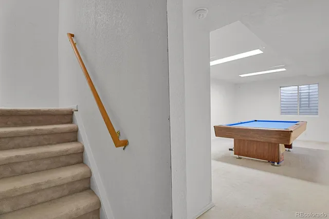 a room with pool table
