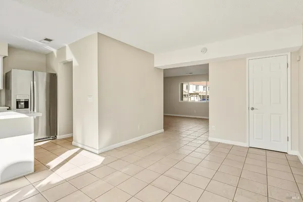 a view of an empty room and window