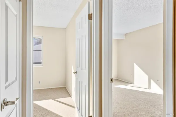 a view of a bathroom with a glass door