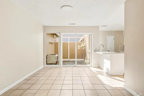 a view of an empty room and window