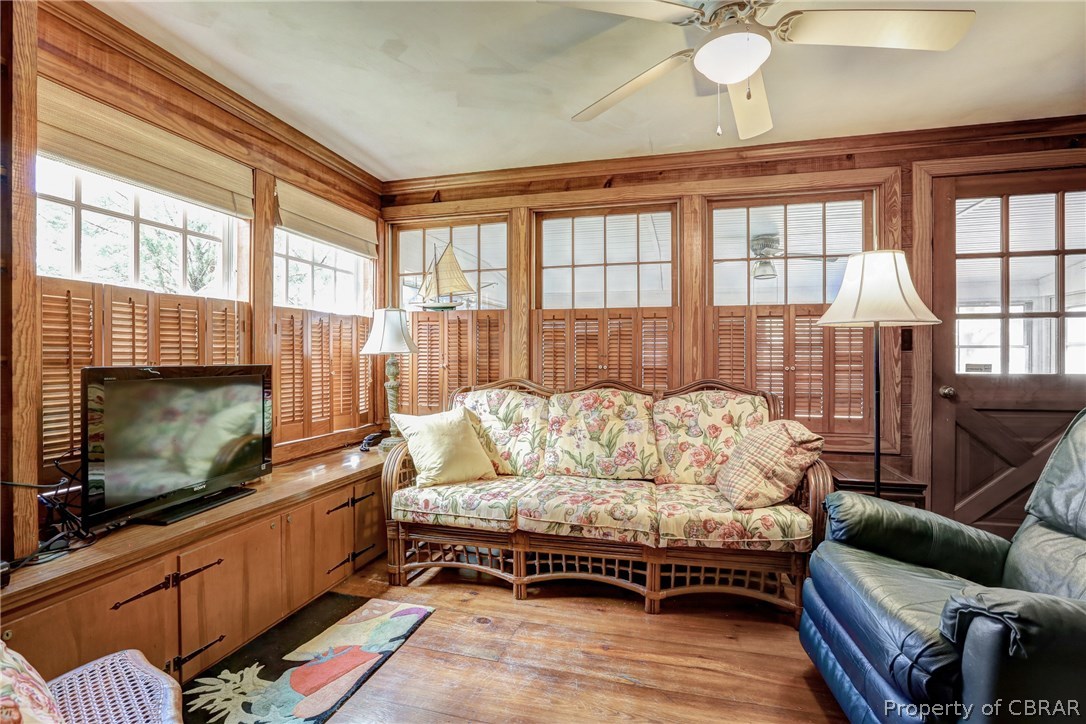 15 Paynes Shop Road Lancaster, VA 22503 - Photo 10 of 26 Heart pine paneling adorn the tv room.