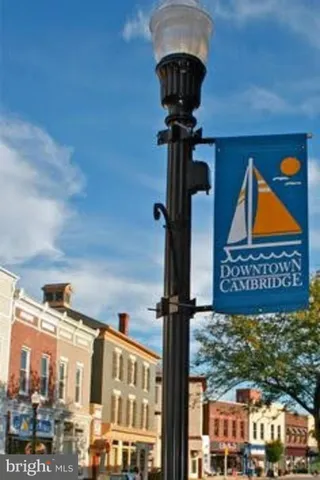 a front view of a building with parking space