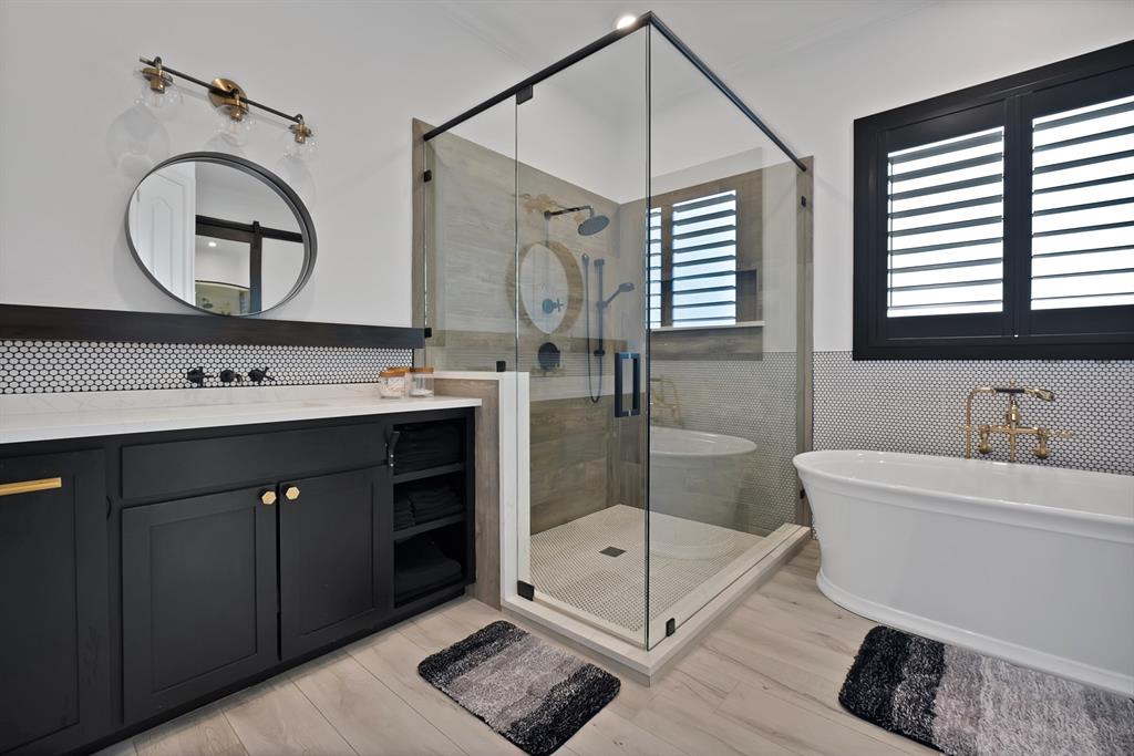 1501 Burleson Retta Road Burleson, TX 76028 - Photo 13 of 40 a bathroom with a sink a toilet a mirror and shower