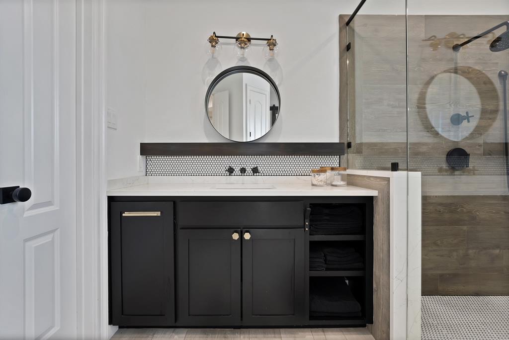 1501 Burleson Retta Road Burleson, TX 76028 - Photo 15 of 40 a bathroom with a sink and a mirror
