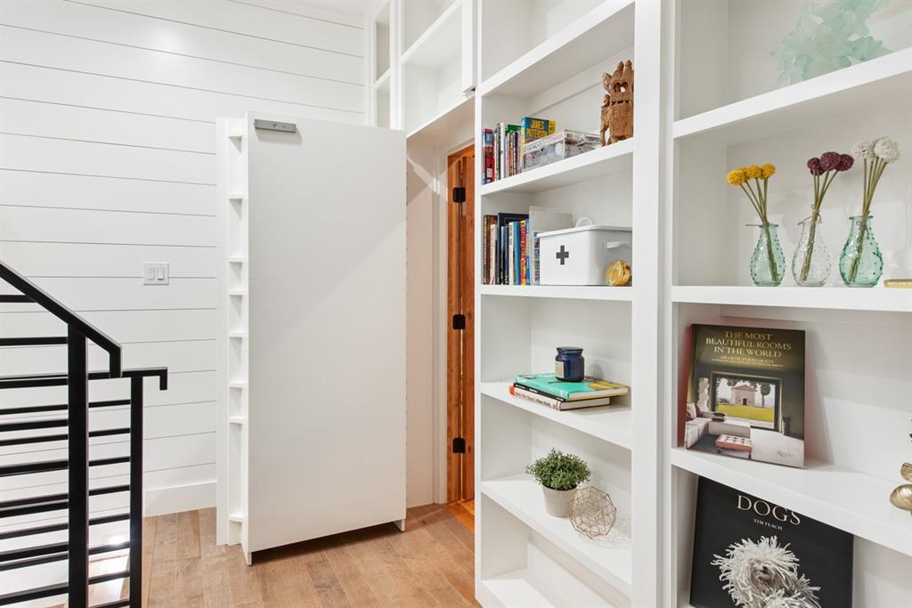 1501 Burleson Retta Road Burleson, TX 76028 - Photo 17 of 40 a living room with furniture and a book shelf