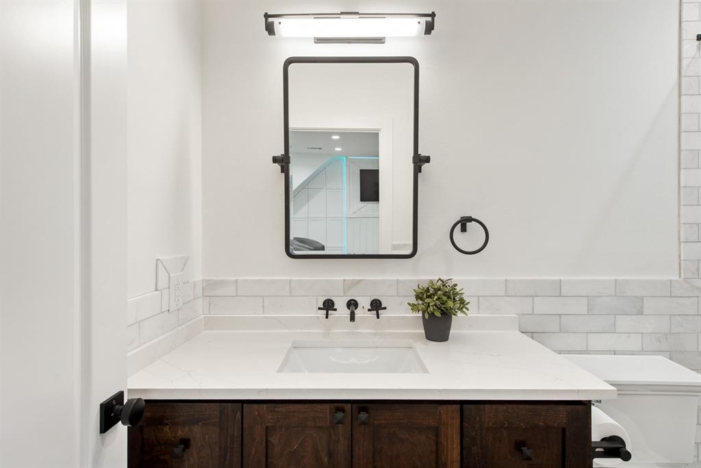 1501 Burleson Retta Road Burleson, TX 76028 - Photo 24 of 40 a bathroom with a sink and a mirror