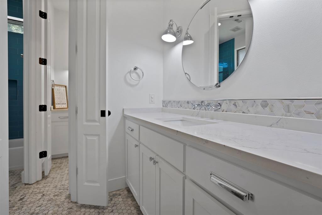1501 Burleson Retta Road Burleson, TX 76028 - Photo 30 of 40 a bathroom with a sink and a mirror