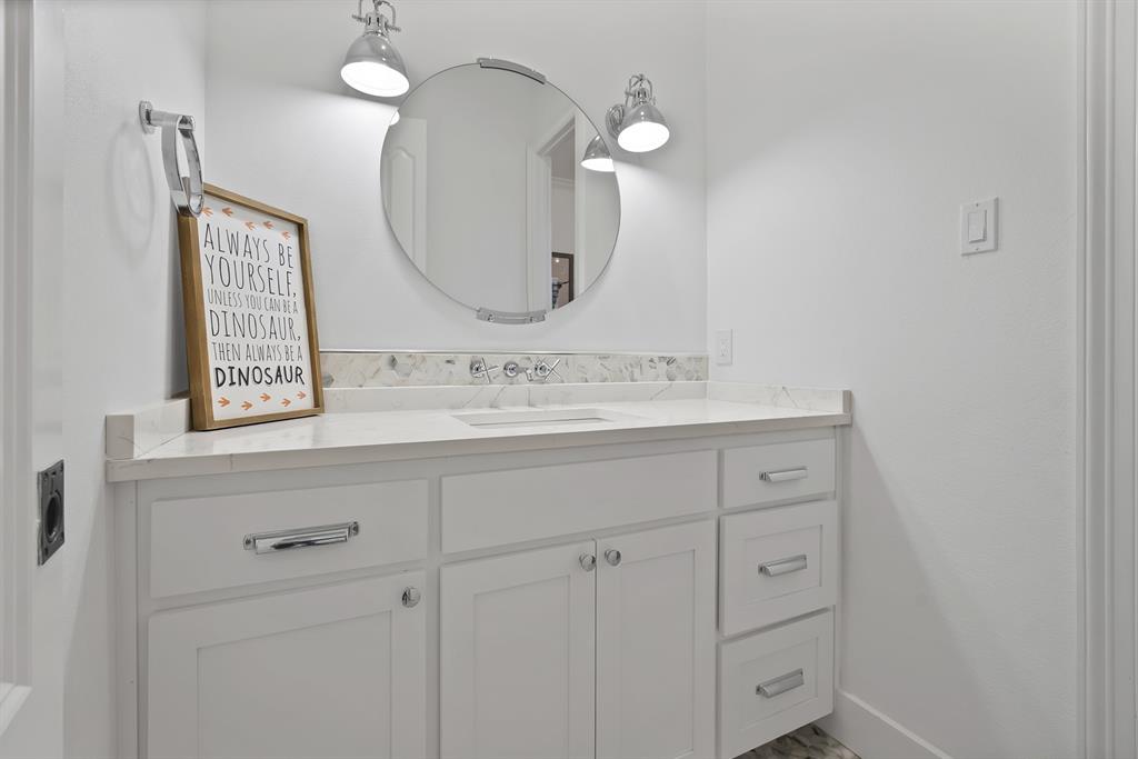 1501 Burleson Retta Road Burleson, TX 76028 - Photo 32 of 40 a bathroom with a sink vanity and a mirror