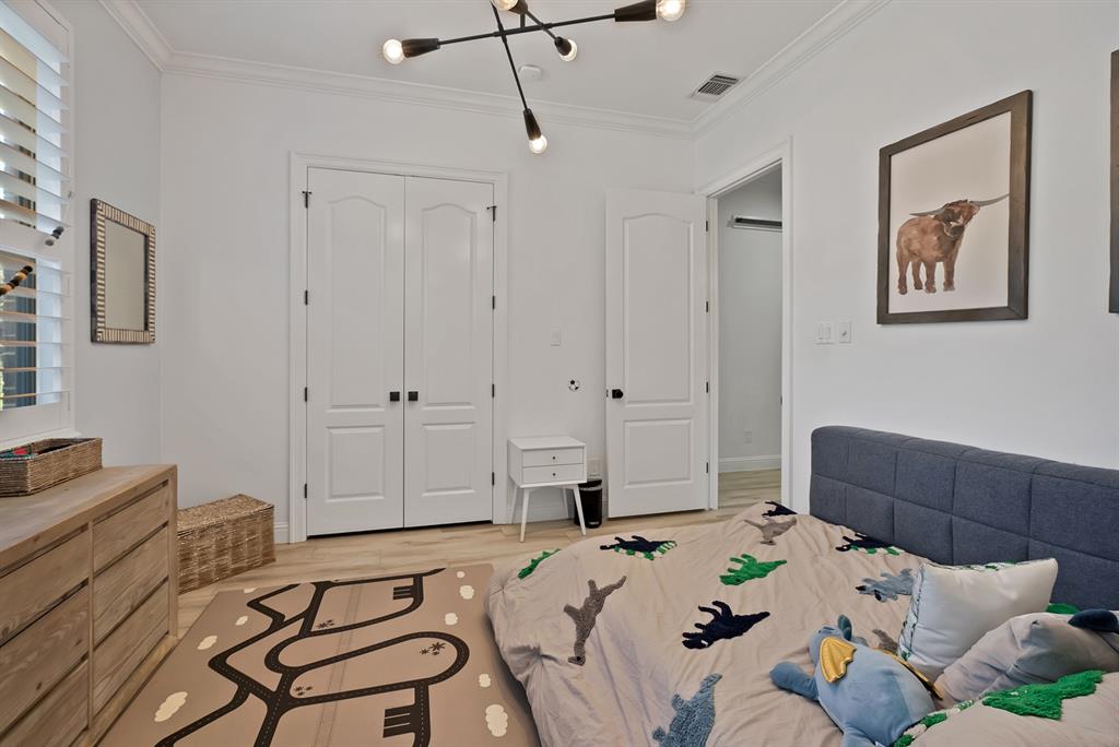 1501 Burleson Retta Road Burleson, TX 76028 - Photo 33 of 40 a bedroom with a bed and furniture