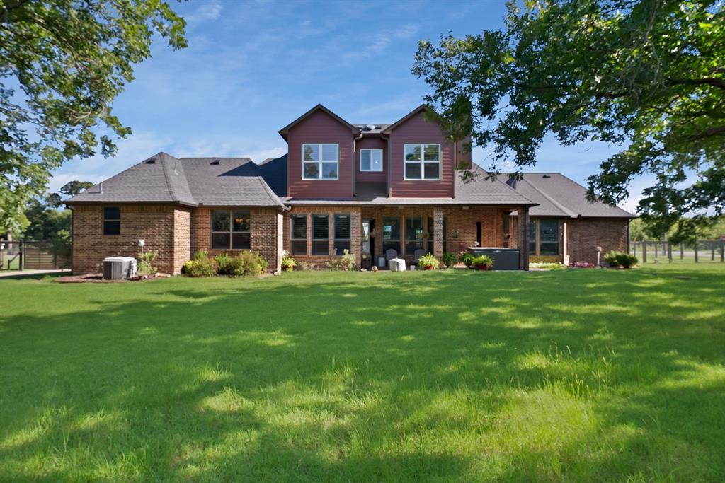 1501 Burleson Retta Road Burleson, TX 76028 - Photo 37 of 40 a front view of a house with a garden