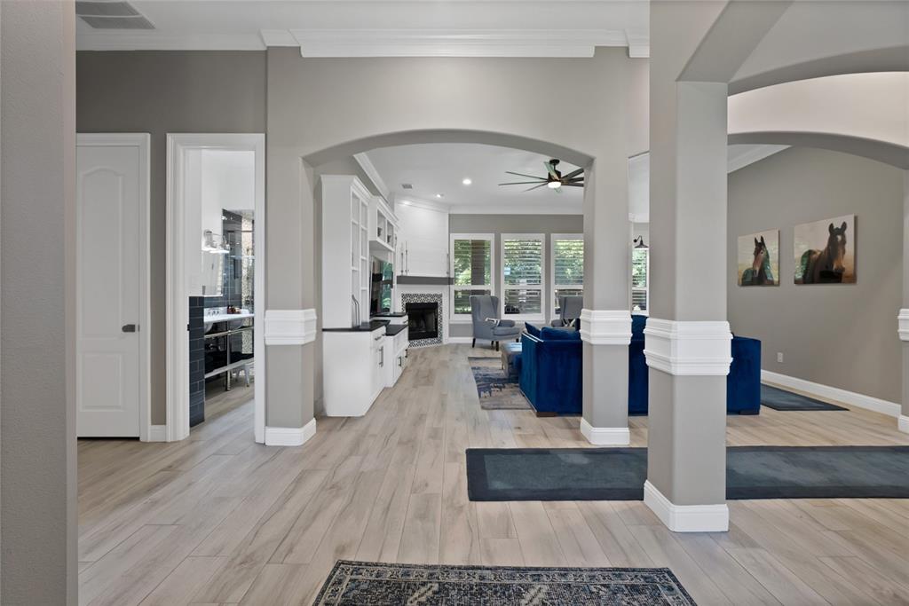 1501 Burleson Retta Road Burleson, TX 76028 - Photo 4 of 40 a living room with furniture and wooden floor