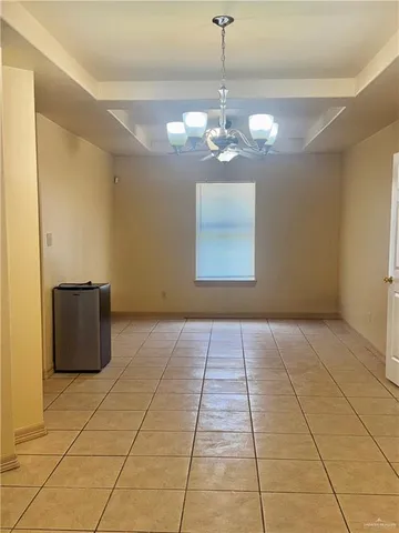 a view of a room with a chandelier