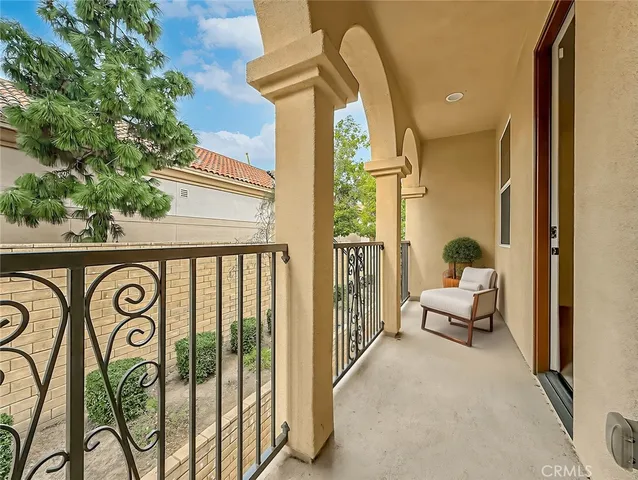a view of a door and a street view