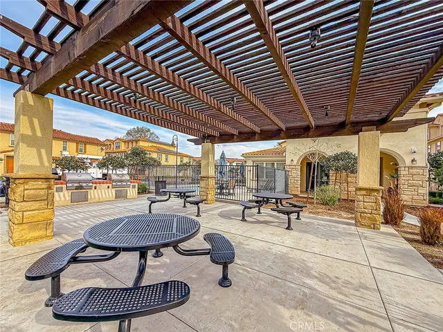 a view of a balcony with wooden floor