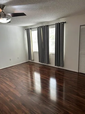 a bathroom with a tub and a shower