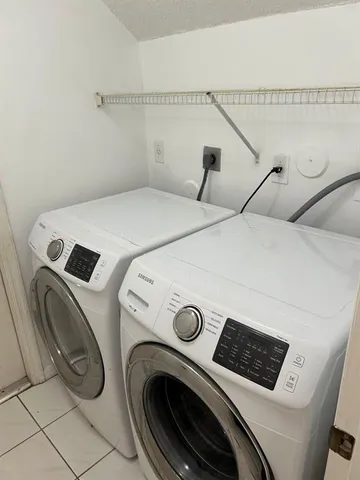 a view of a livingroom with wooden floor