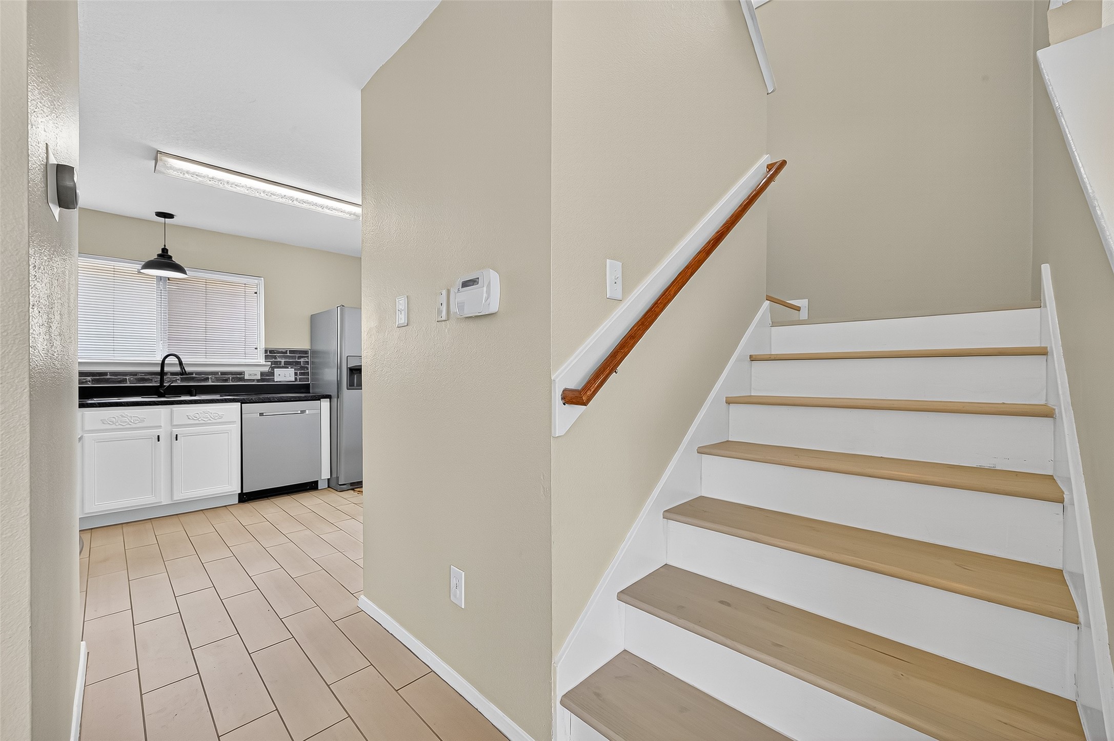 6343 Settlers Square Lane Katy, TX 77449 - Photo 13 of 41 a kitchen with cabinets and a stove
