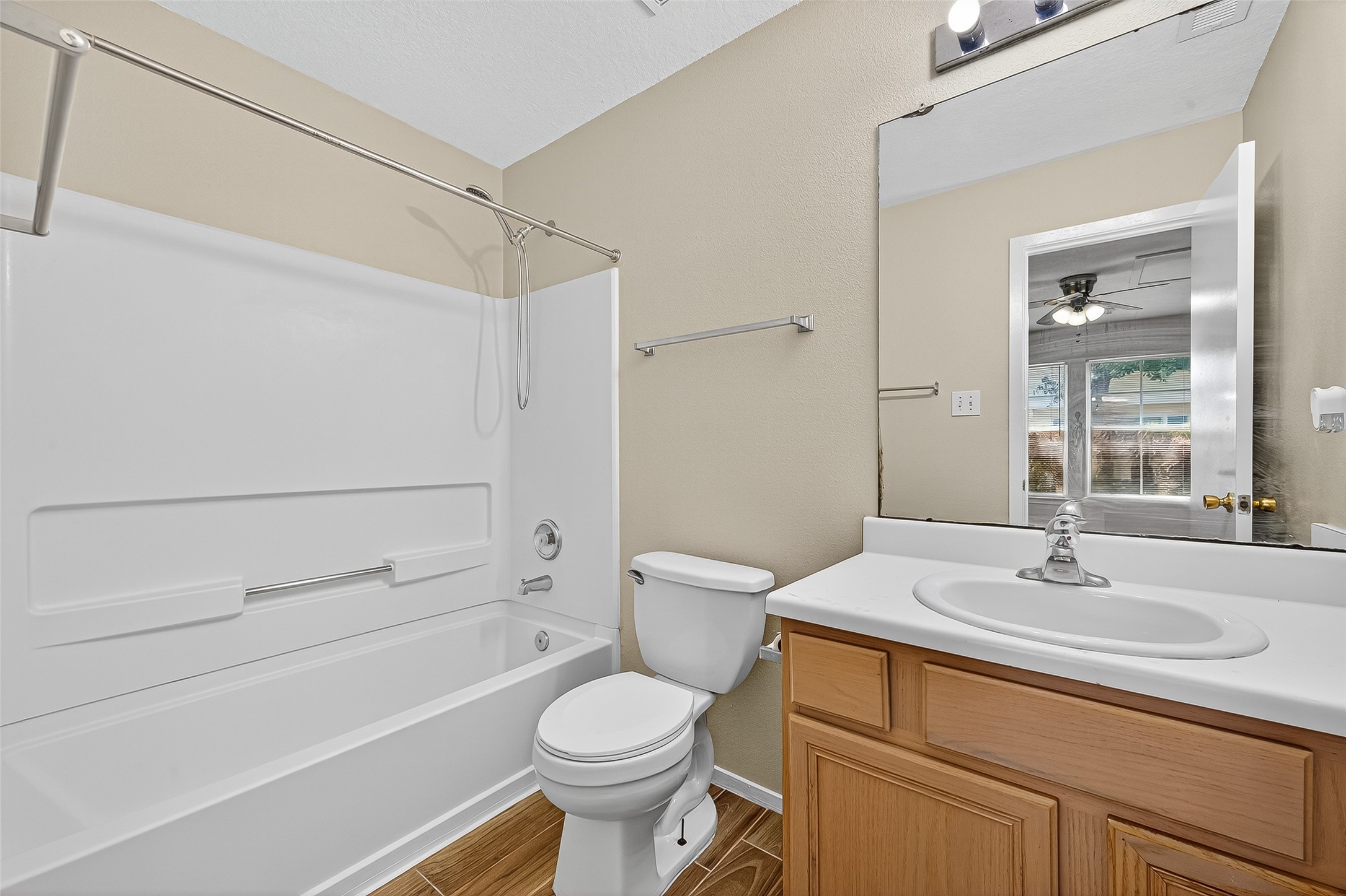 6343 Settlers Square Lane Katy, TX 77449 - Photo 20 of 41 a bathroom with a sink a toilet and shower